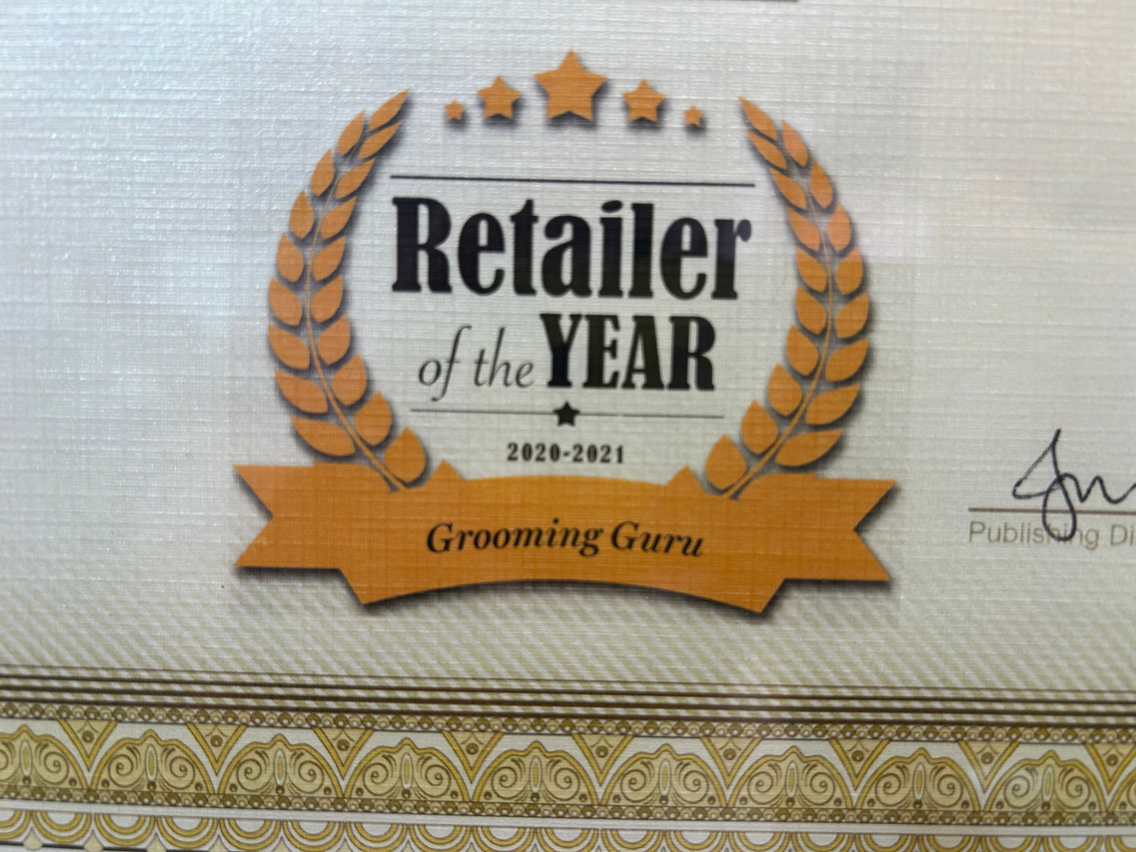 Retailer of the Year 2020–2021 — Grooming Guru award certificate